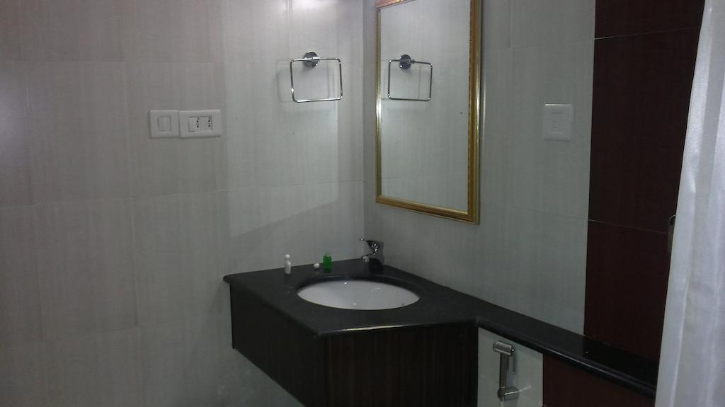 Hotel Sea Palace Kollam Oda fotoğraf